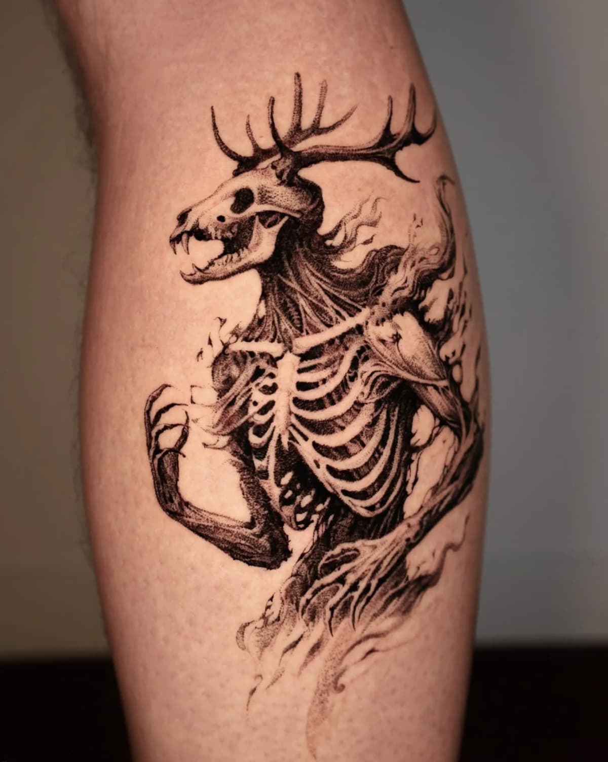 Skeletal deer creature with antlers