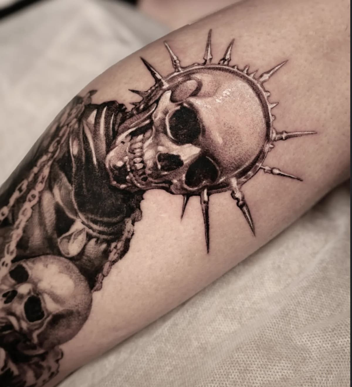 Spiked skull with chains