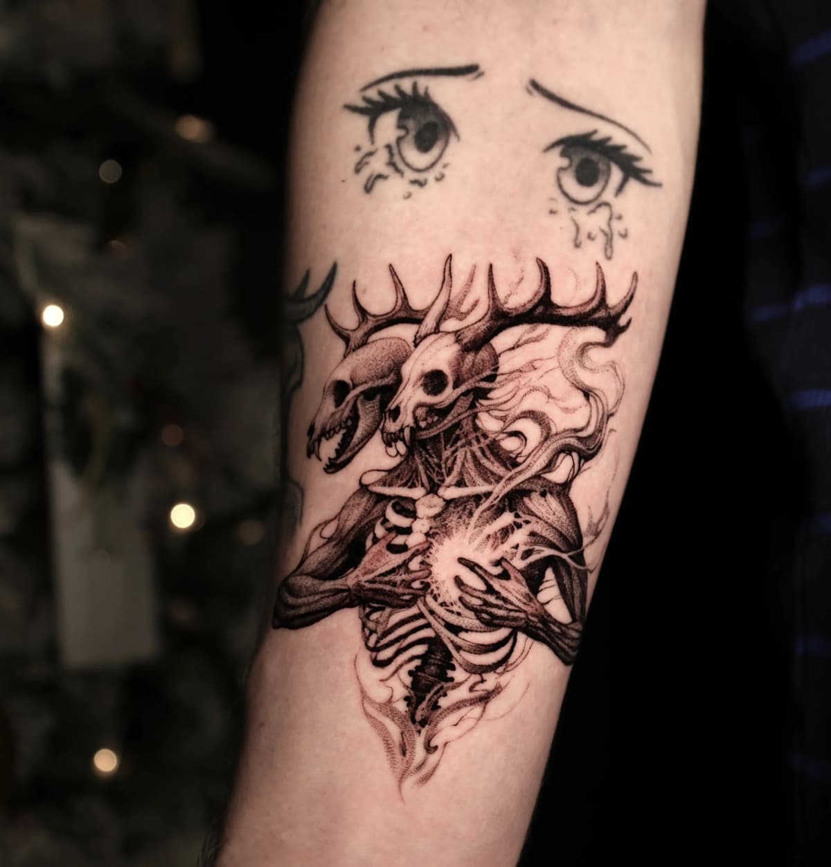 Two skeletal deer creatures intertwined